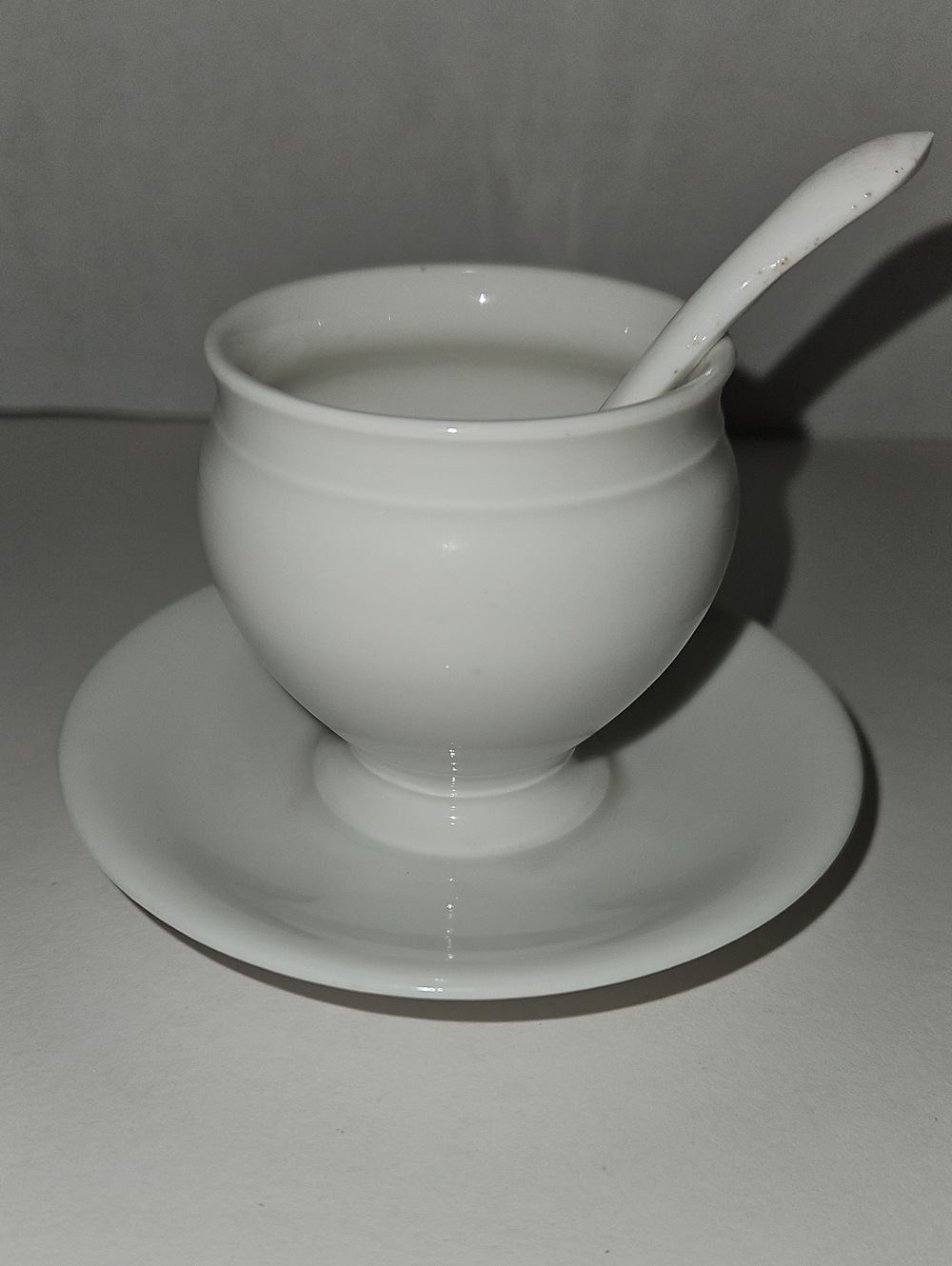 White Ceramic Egg Cup with Saucer and Spoon
